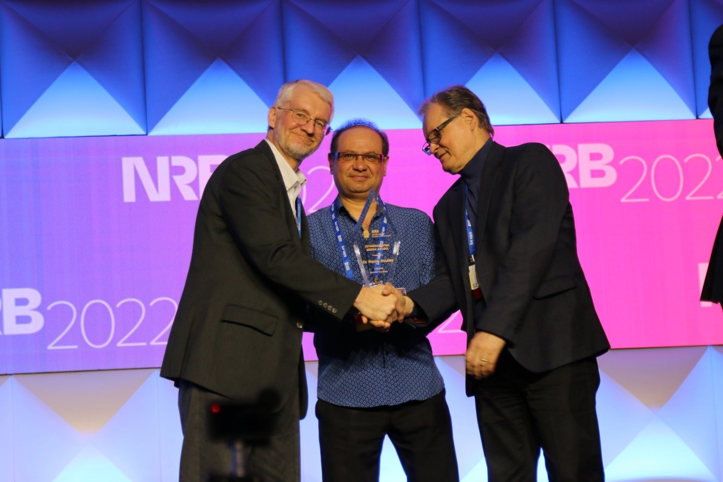 Dr. Hannu Haukka At Right Receiving the NRB 2022 International Media Award